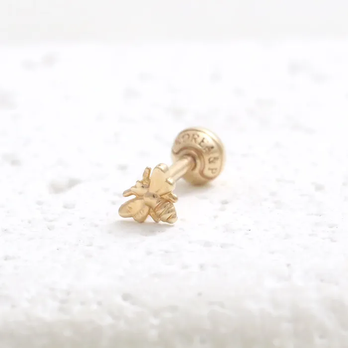 Earrings from J Shop Tiny Bee Ear Piercing