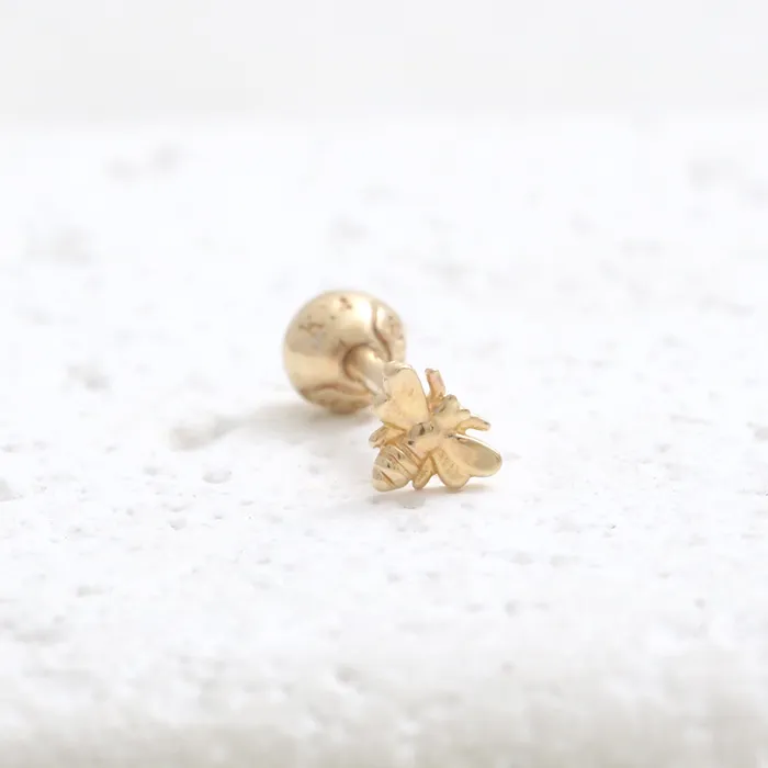 Earrings from J Shop Tiny Bee Ear Piercing