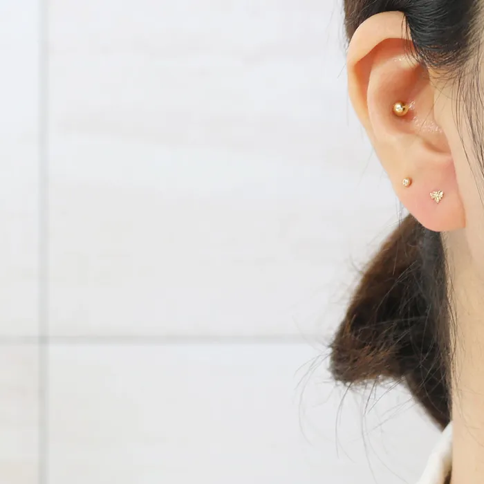 Earrings from J Shop Tiny Bee Ear Piercing