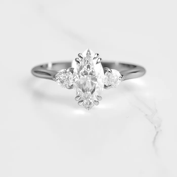 Marquise Moissanite Ring With Accent Stones three stone ring Capucinne Rings