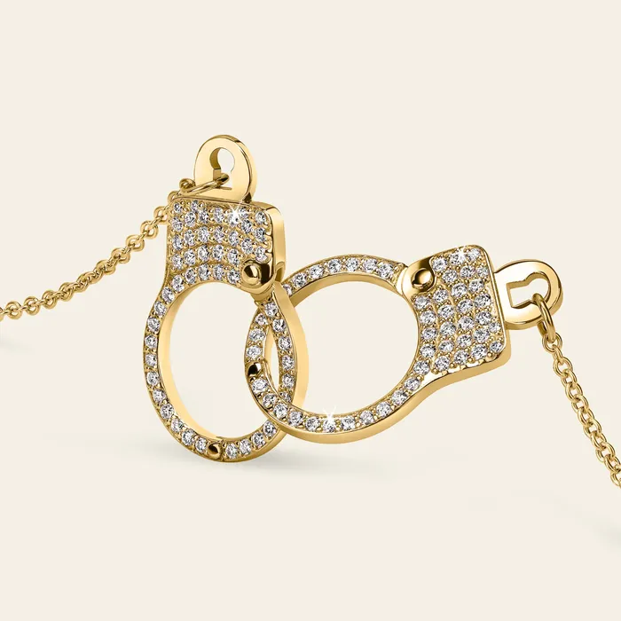 Necklaces Hand crafted in 18k yellow gold and set with 100 highquality round brilliant cut diamonds Love Lockdown Interlocking Diamond Necklace