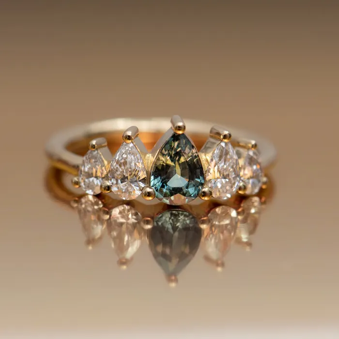 Rings ARTEMER Unique Engagement ring with a Pear Cut Teal Sapphire and Diamonds